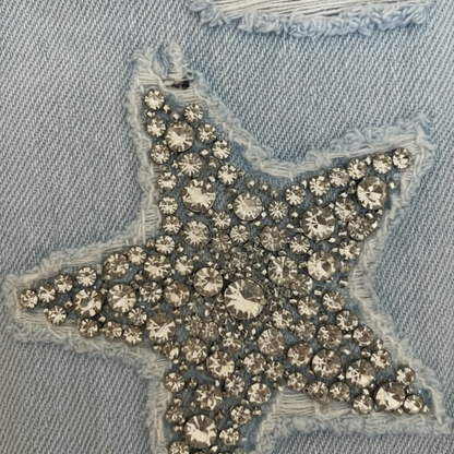 Women’s Distressed Denim Jeans with Rhinestone Star Patch Design